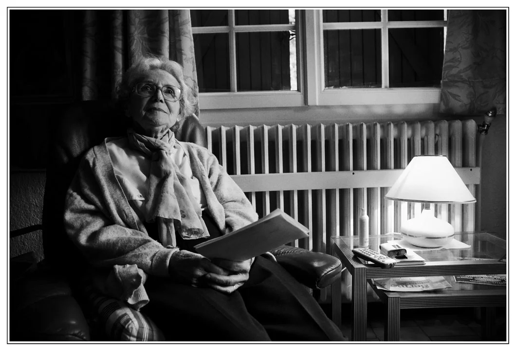  Suzanne Orts at her house, deported to Neue Bremm the 12 June 1944. She's holding her flight ticket to come back where she was deported. 