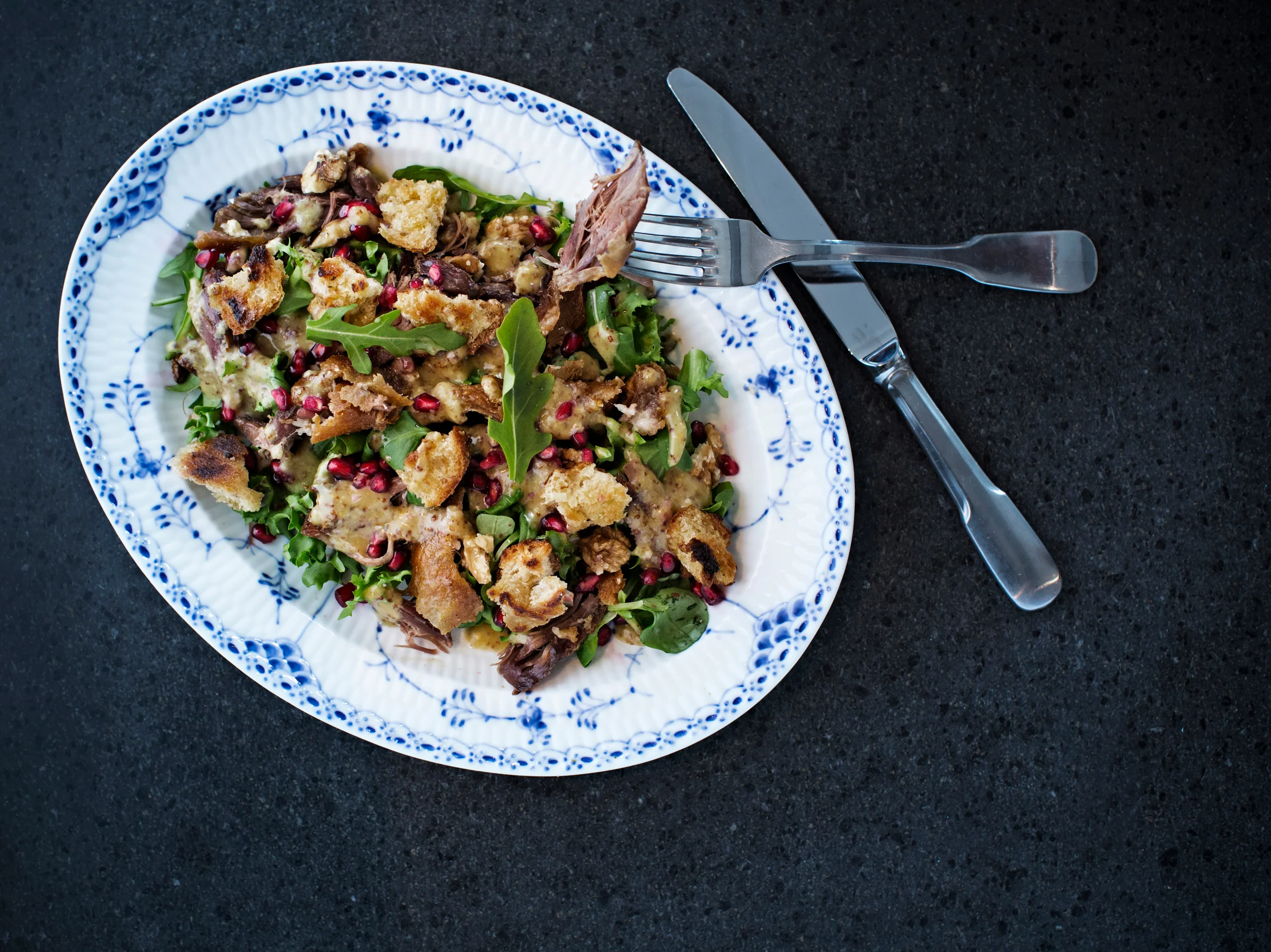 Adam Price builds up the perfect salad with duck confit for an article on his favourite Christmas dishes . He also made us a scoop of homemade vanilla icecream. Sublime.