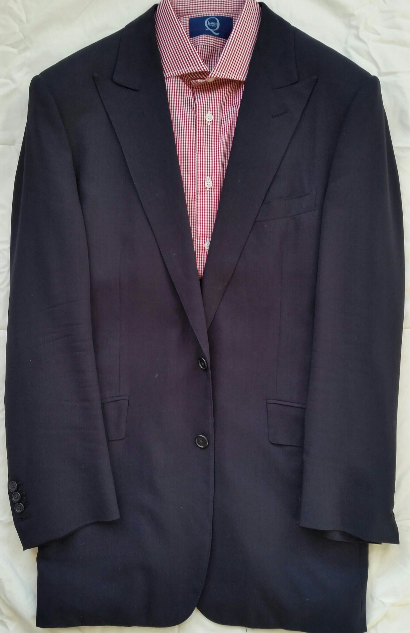 Navy Peak lapel suit with slanted pockets
