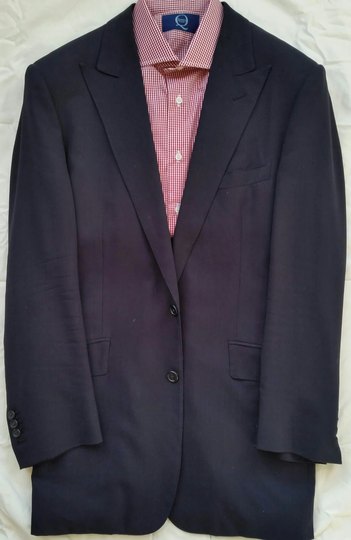 Navy Peak lapel suit with slanted pockets