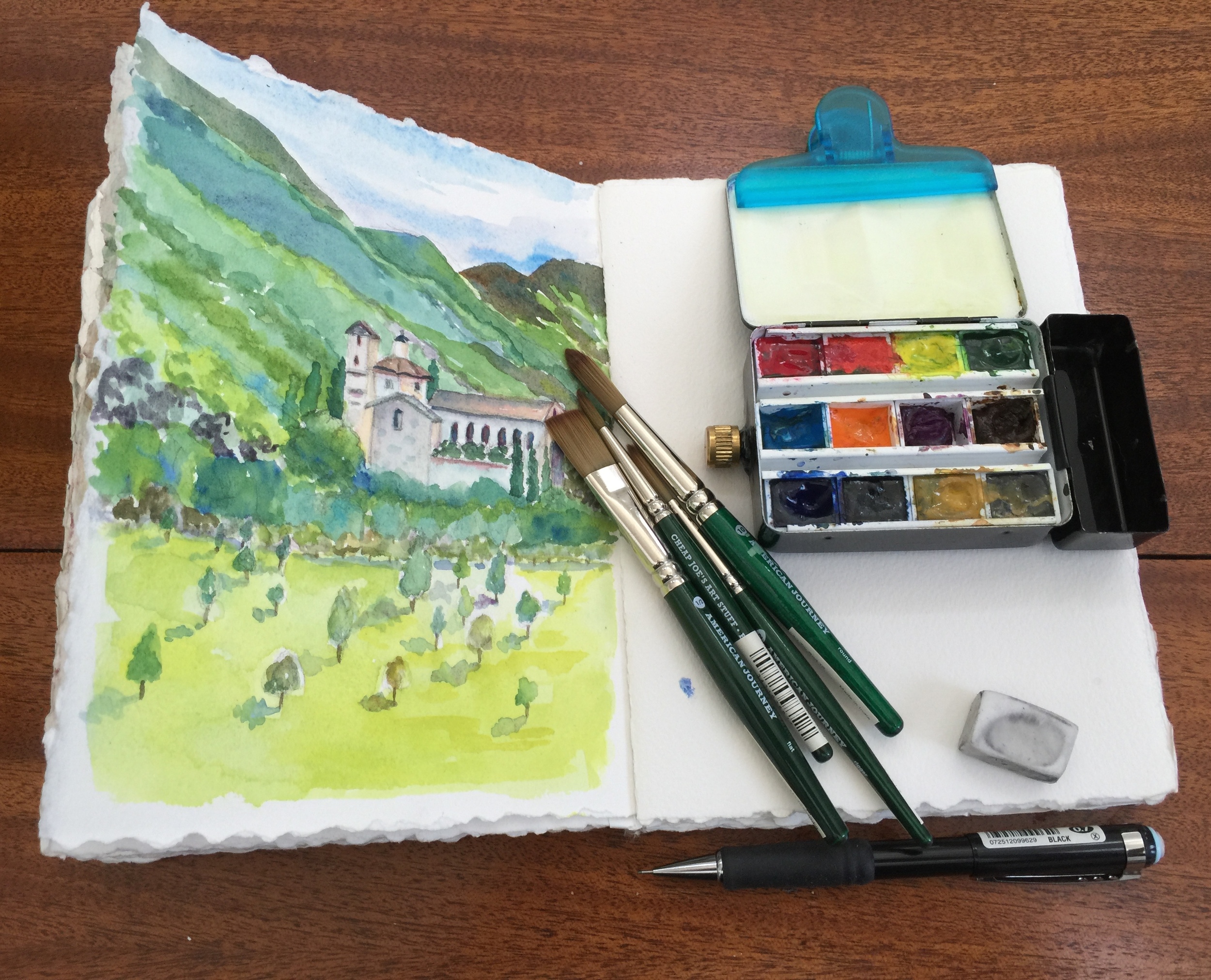 I clipped the paintbox to my sketchbook with a clip I bought in Tuscany because Charlotte had one. 