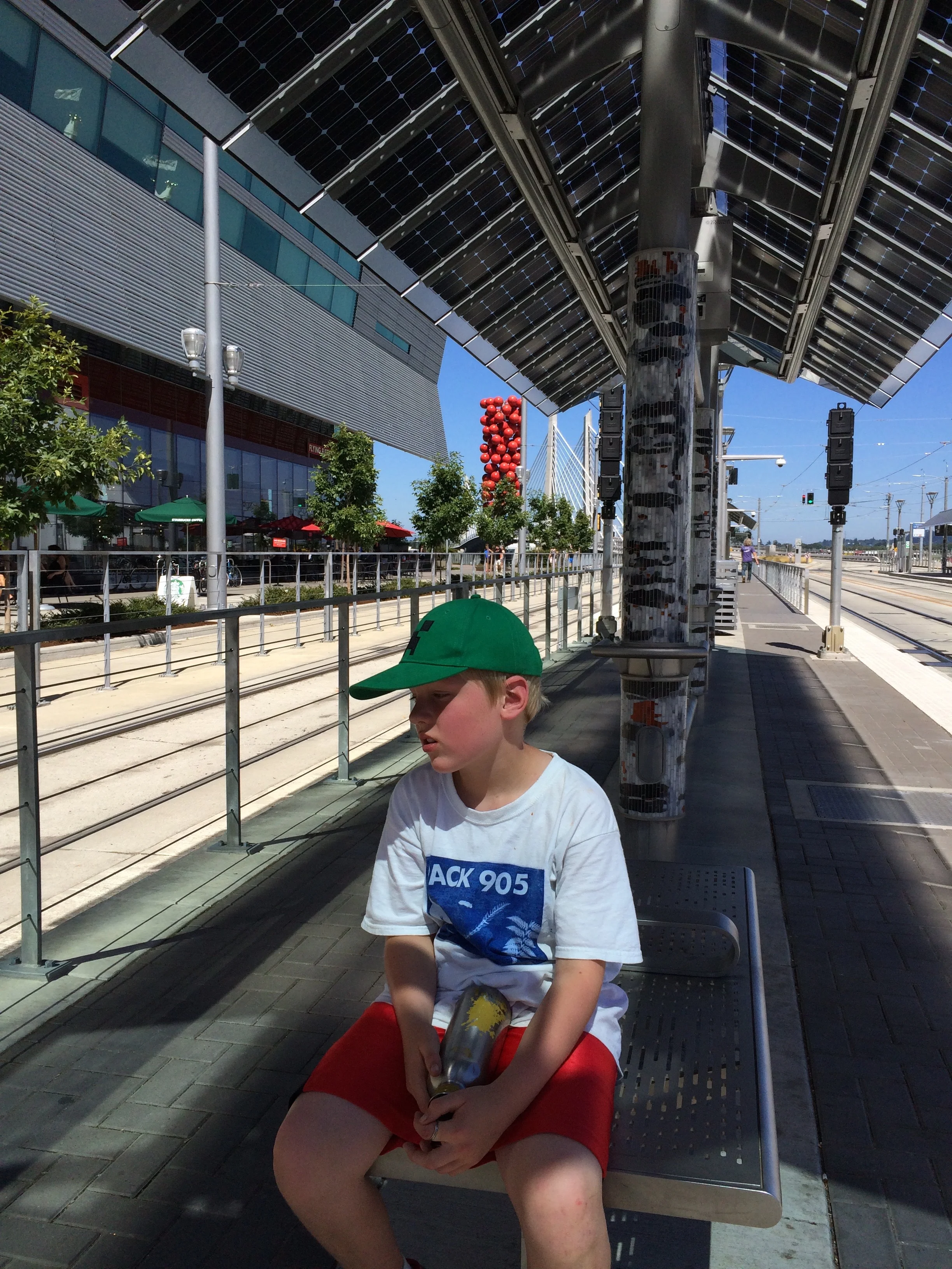 Waiting for the light rail. Starting to get hot and a bit tired.