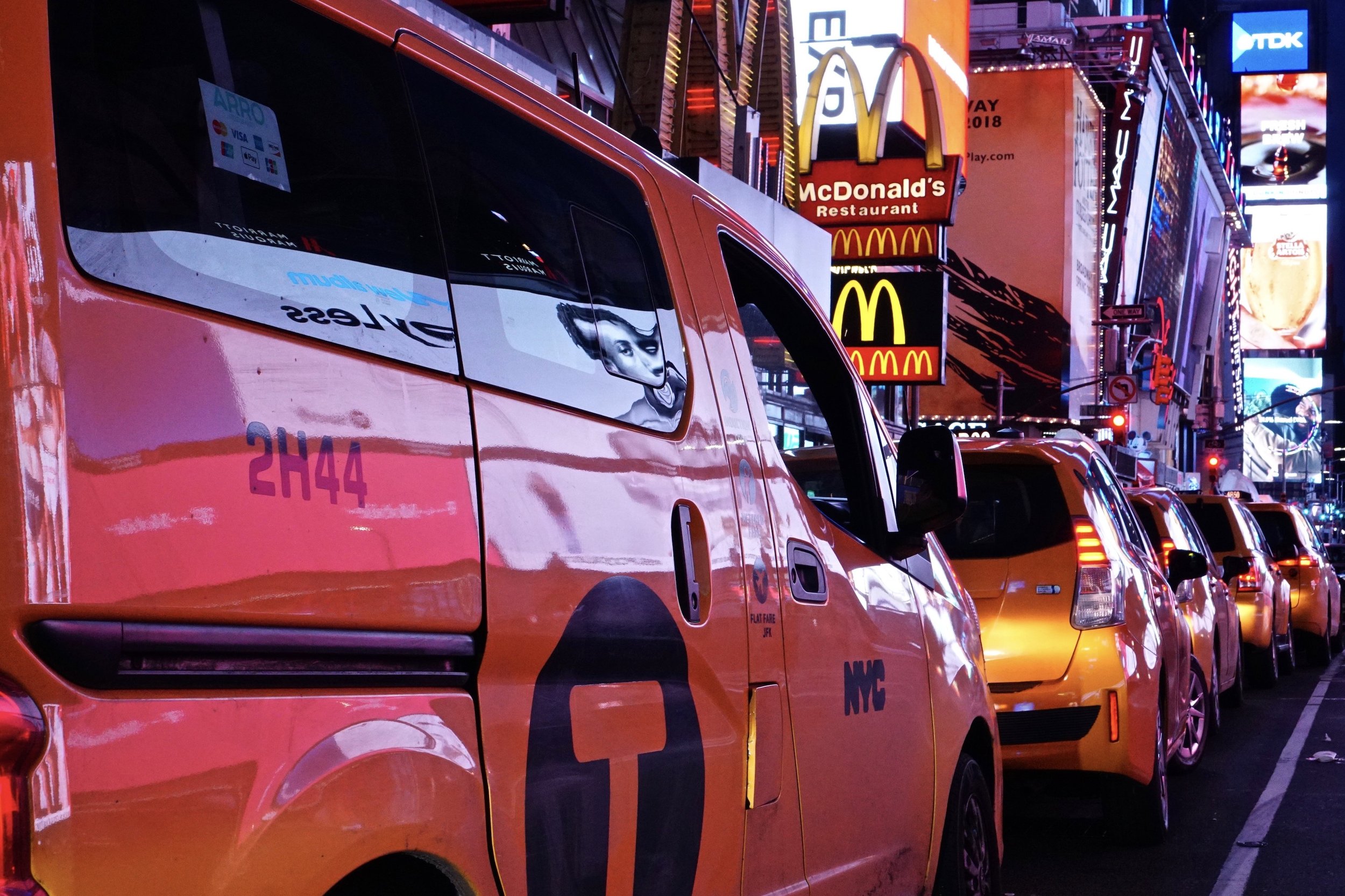 Cabs at night in Times Square