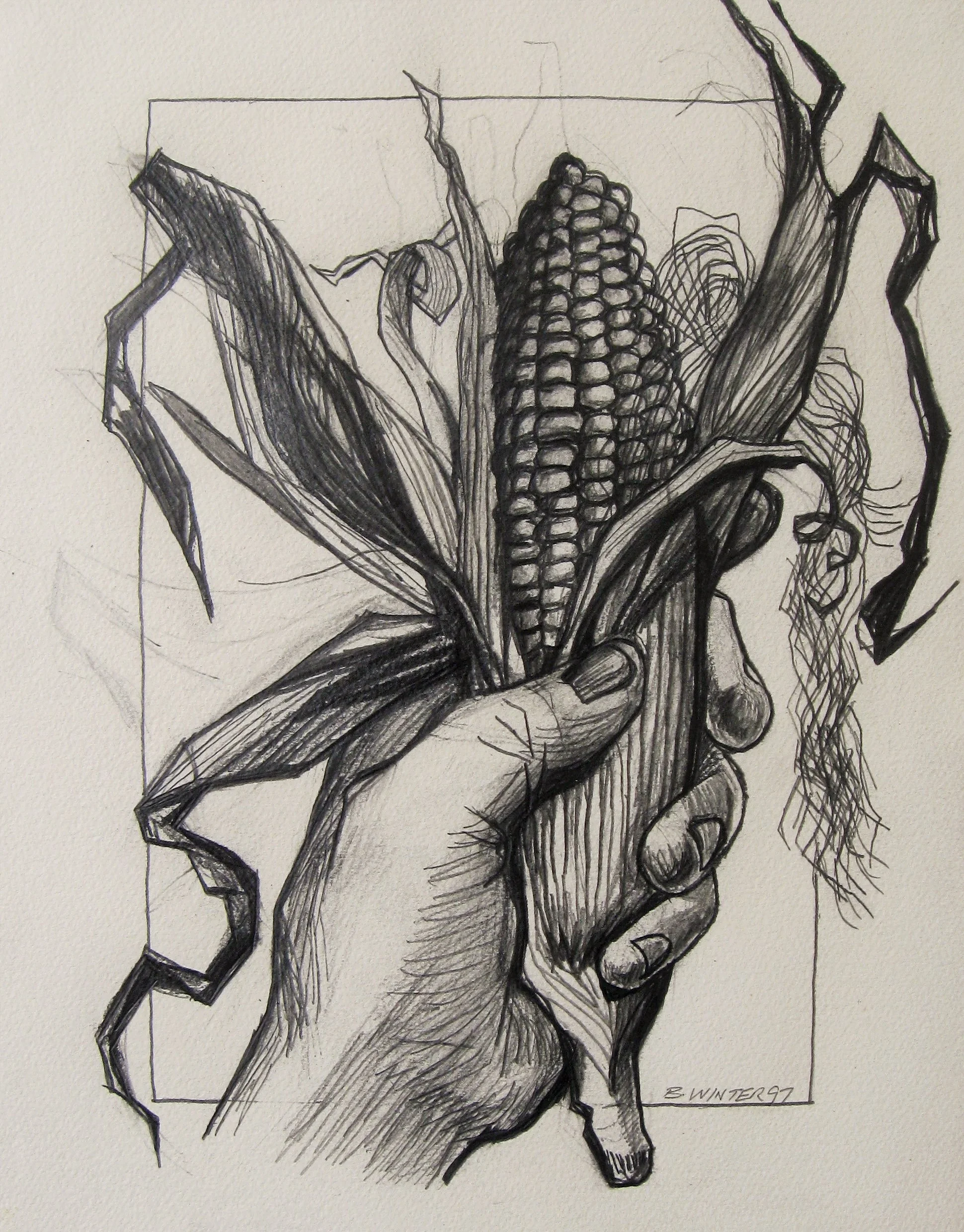 Hand Holding Corn