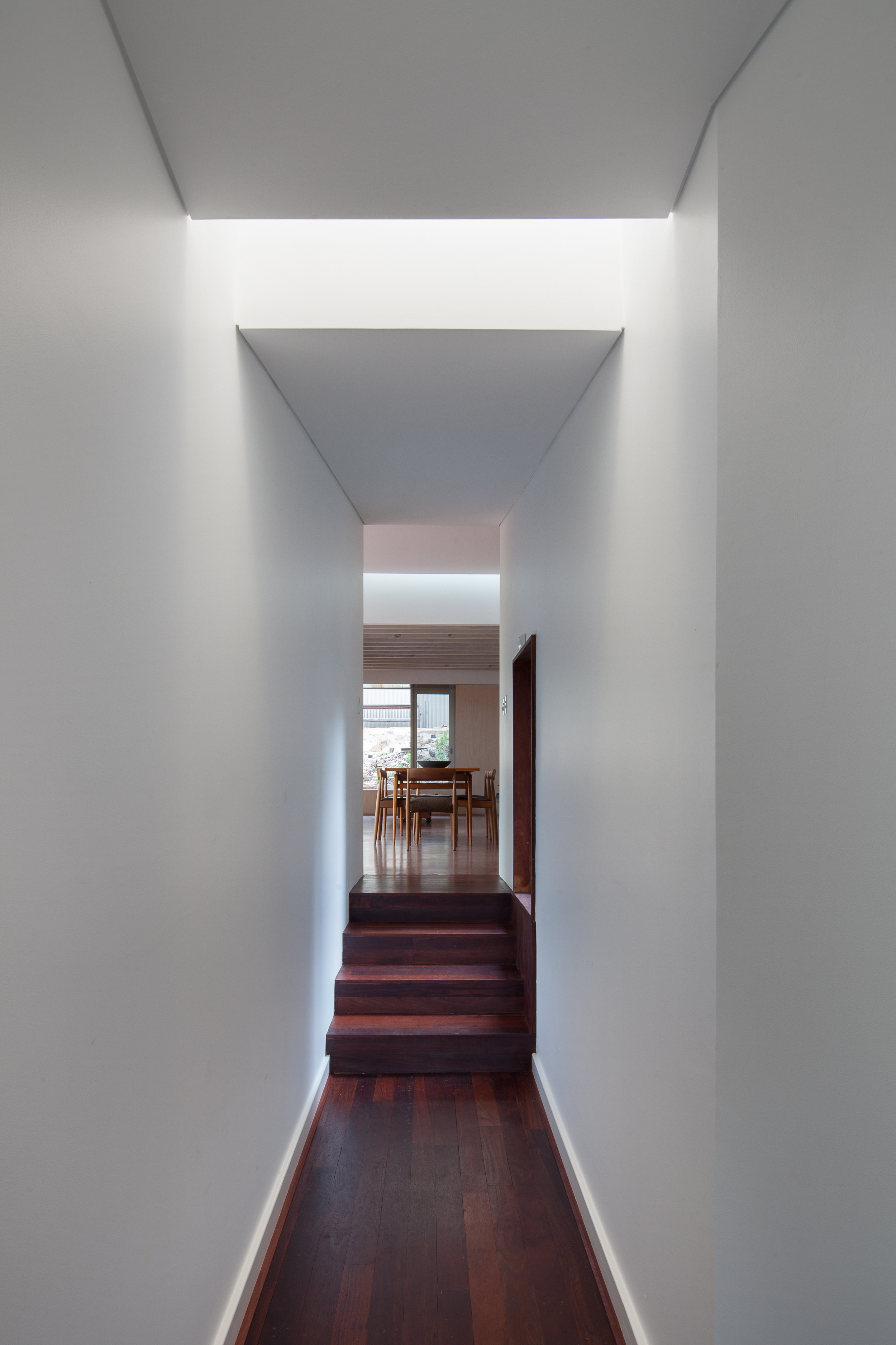 hallway with top light, photographs by john madden