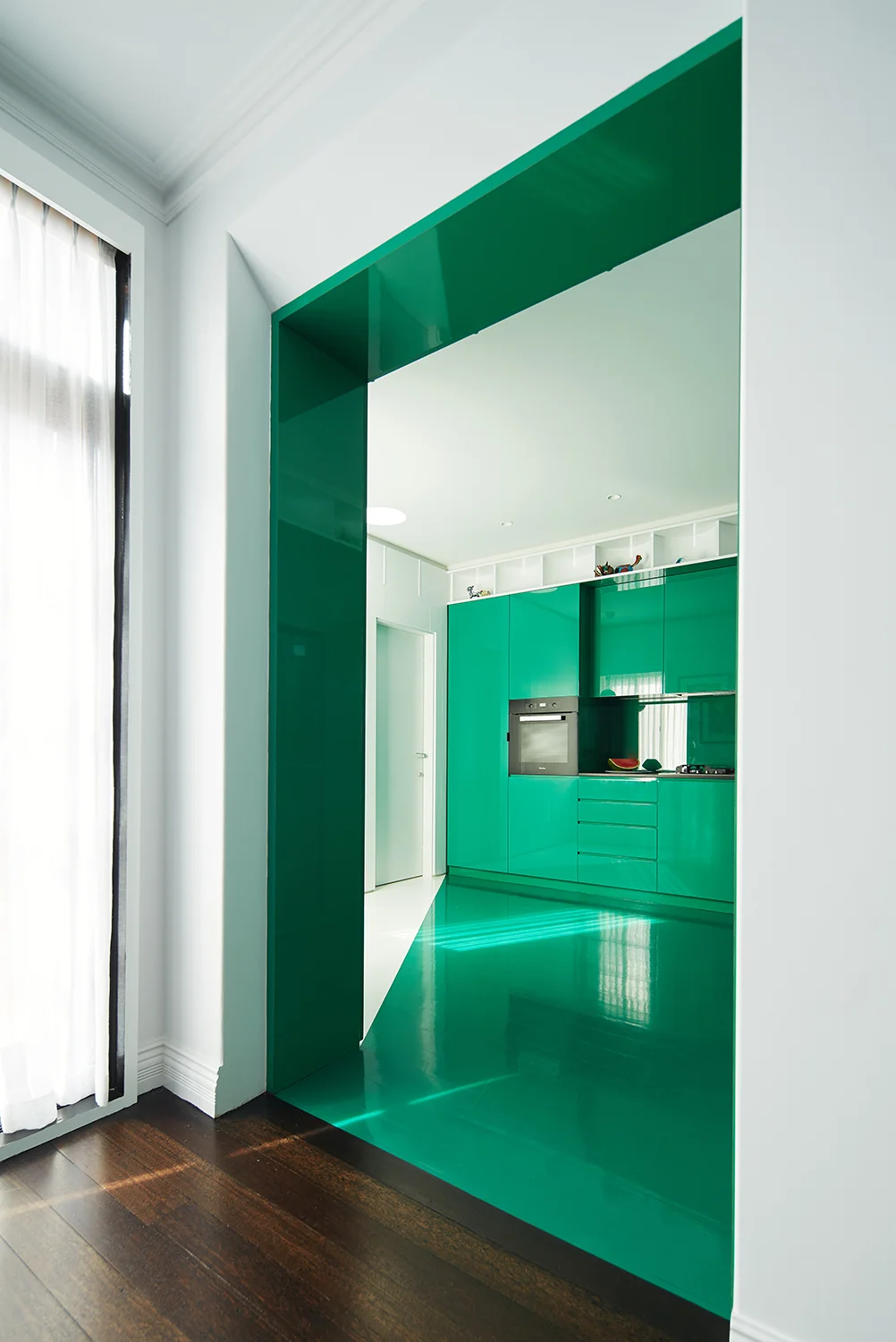glimpse to kitchen from dining room