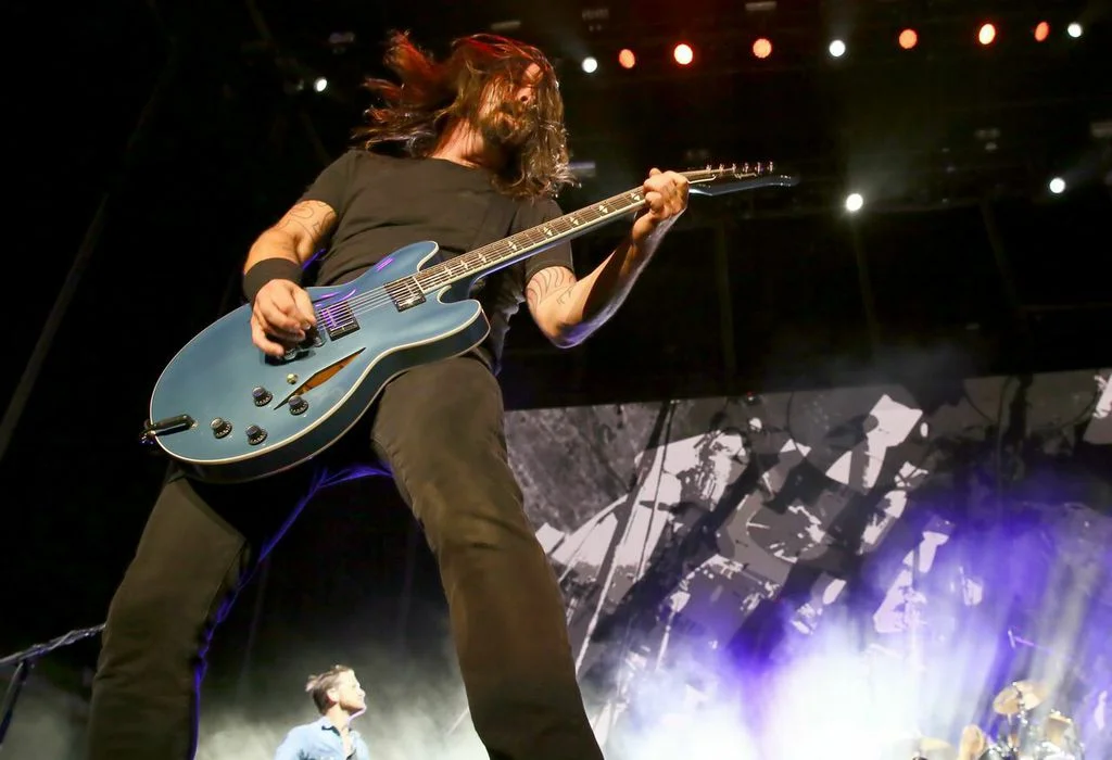  Dave Grohl Doing What He Does Best- Rockin' Out!  Photo Credit: Powers Imagery&nbsp; 