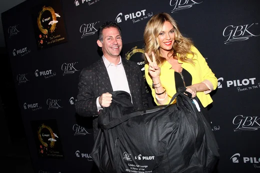   GBK CEO Gavin Keilly (L) and actress Jasmine Dustin attend the Pilot Pen and GBK Luxury Lounge honoring Golden Globe nominees and presenters held at the W Hollywood on January 9, 2015 in Hollywood, California. (Photo by Tommaso Boddi/Getty Images f