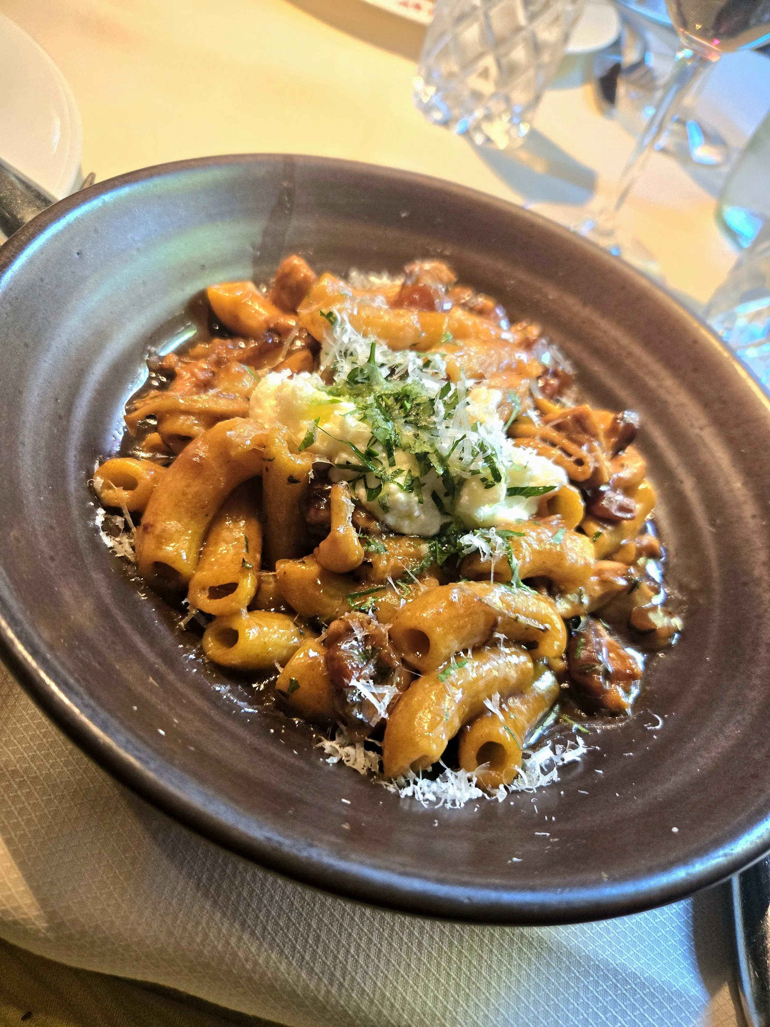 Rigatoni al Coniglio from Bottega Napa Valley: Balsamic marinated rabbit, house-made ricotta, caramelized wild mushrooms, and pancetta.