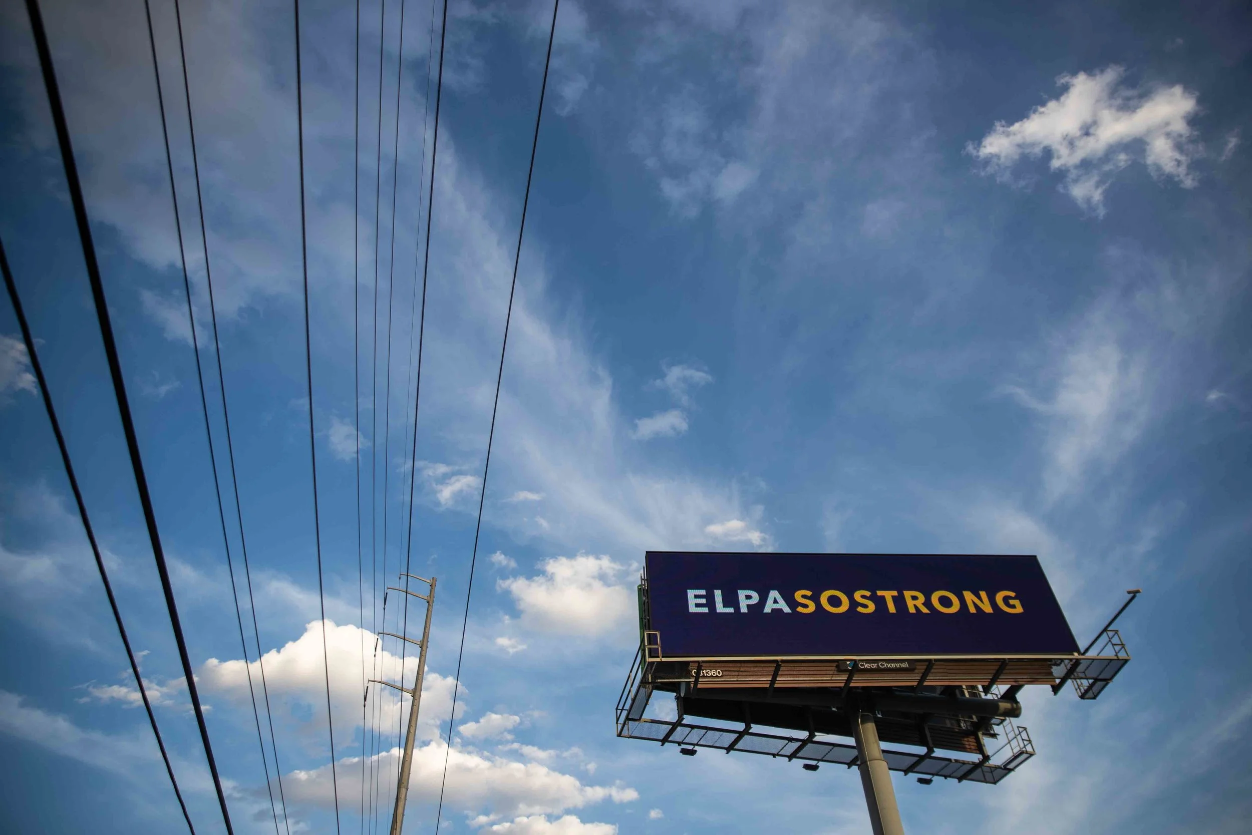 A banner that reads "ELPASOSTRONG" is located near Lomaland Dr in El Paso on Monday, August 5, 2019.
