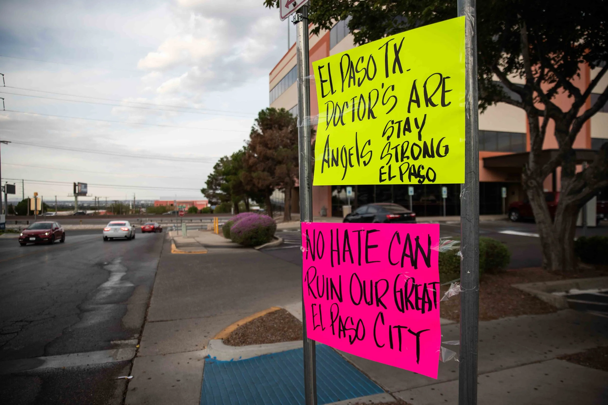 Someone left a couple of signs outside Del Sol Medical Center after a mass shooting occurred at Walmart early Saturday in El Paso, TX on Sunday, August 4, 2019.