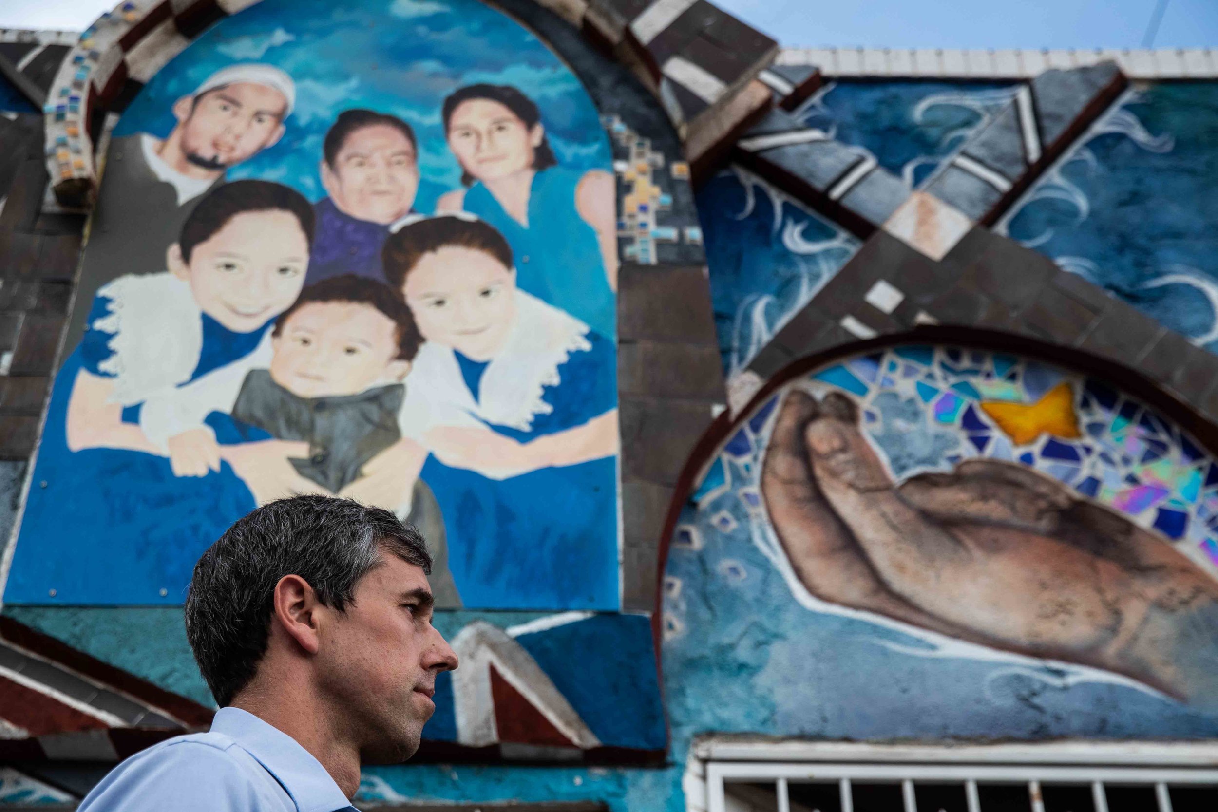  Democratic presidential candidate Beto O'Rourke walks in front of a mural at Yandell Dr. during a silent march in honor to the victims of a mass shooting occurred in Walmart on Satuday morning in El Paso on Sunday, August 4, 2019. 