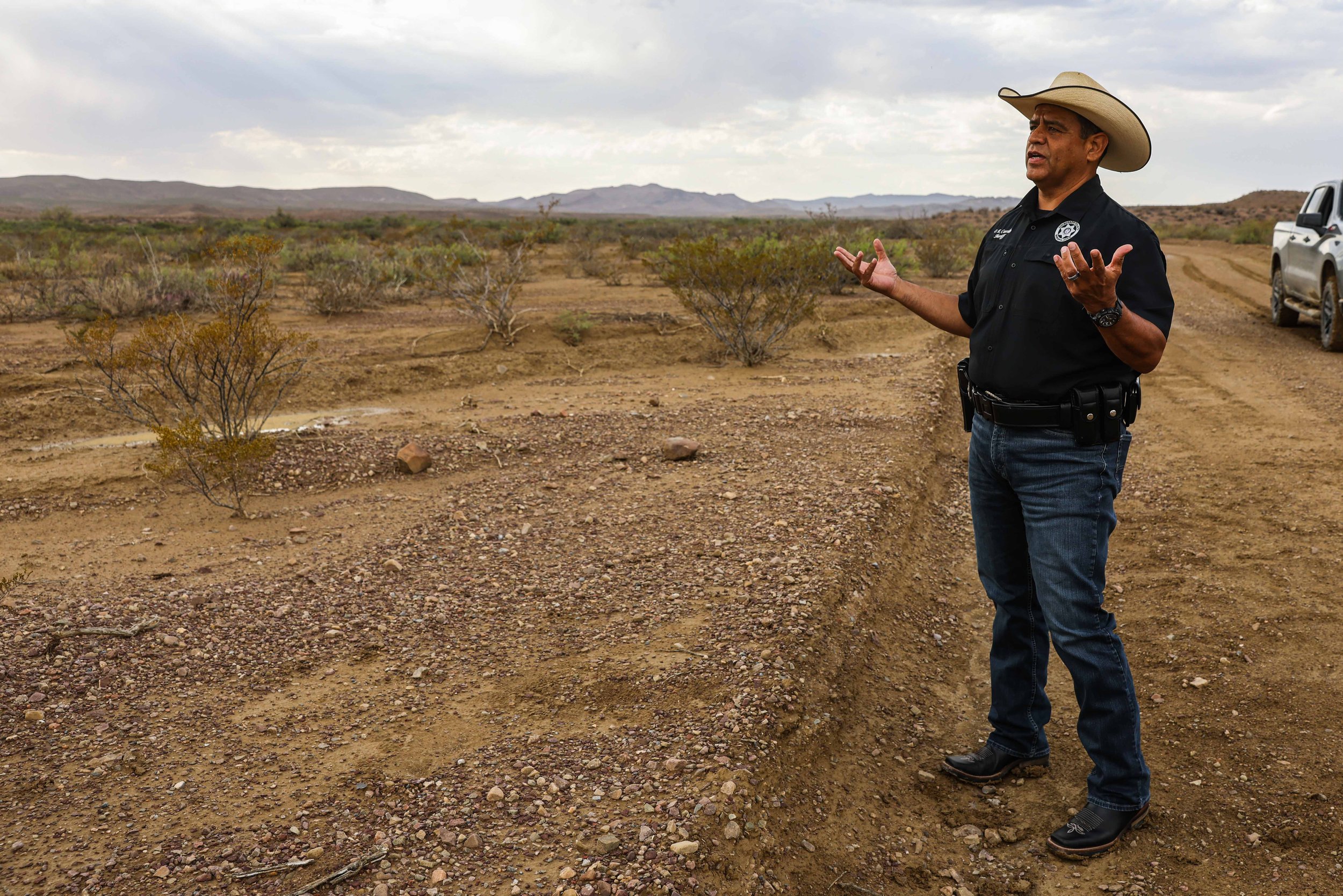  Culberson County Sheriff Oscar Carrillo stands by the spot where the body of 15-year-old Christian was found on June 21, 2021. 