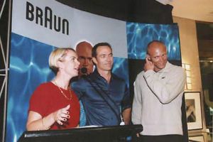   Paul Freeman with Michael Klim at the opening of the exhibition of his portraits of the sports star to commemorate Braun’s 50th&nbsp;anniversary, at Chifley Tower, 2001  