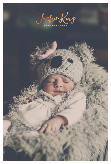 Cute as a button in her Koala bear hat!!!