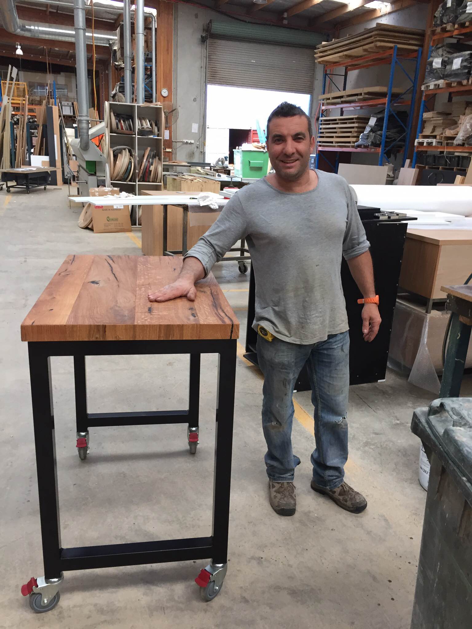 Paolo, on of our Furniture Makers happy with a completed Drybar for Hombre Makay
