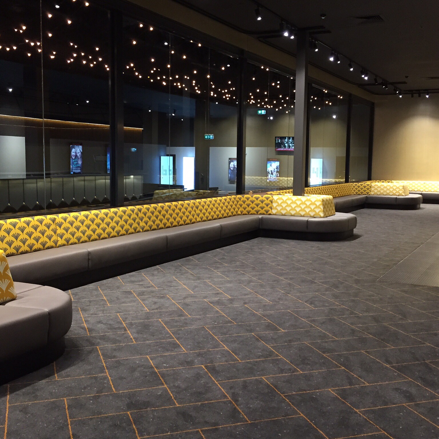 Event cinema Gold Class Pacific Fair. Custom long banquette.