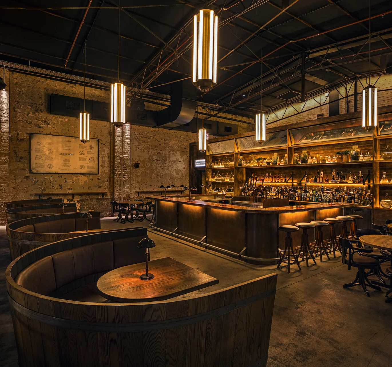 Archie Rose wine-barrel booths. Image via calida.com.au