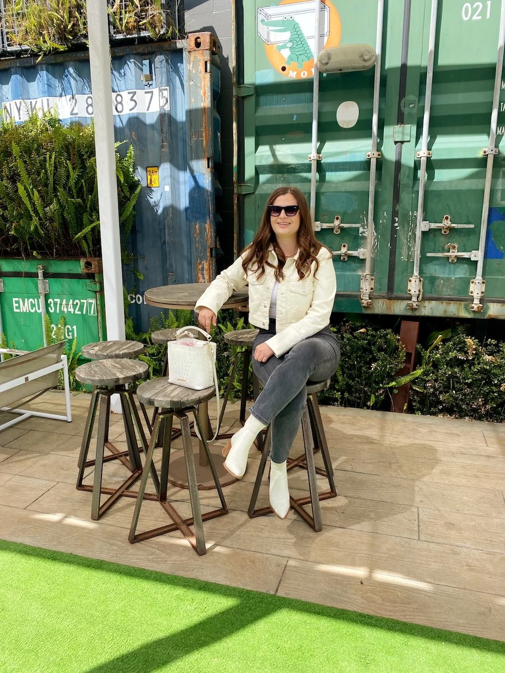 Keep Calm and Chiffon Blogger Austen Tosone shares Denim Jacket Outfit Ideas + Styling Tips - in photo: Austen wearing Gray Wash Denim and White Accessories