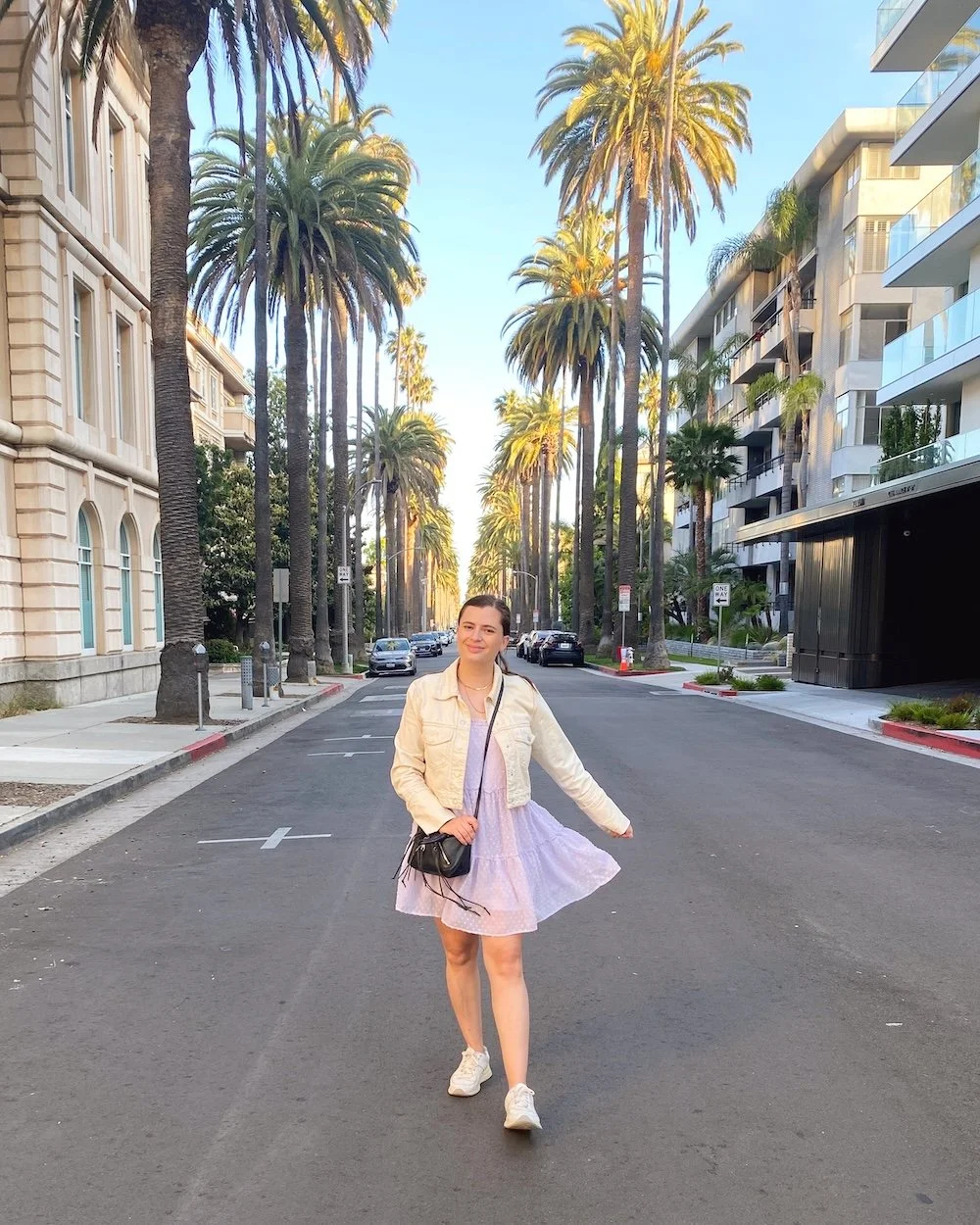 Keep Calm and Chiffon Blogger Austen Tosone shares Denim Jacket Outfit Ideas + Styling Tips - in photo: Austen wearing A-Line Dress and Sneakers
