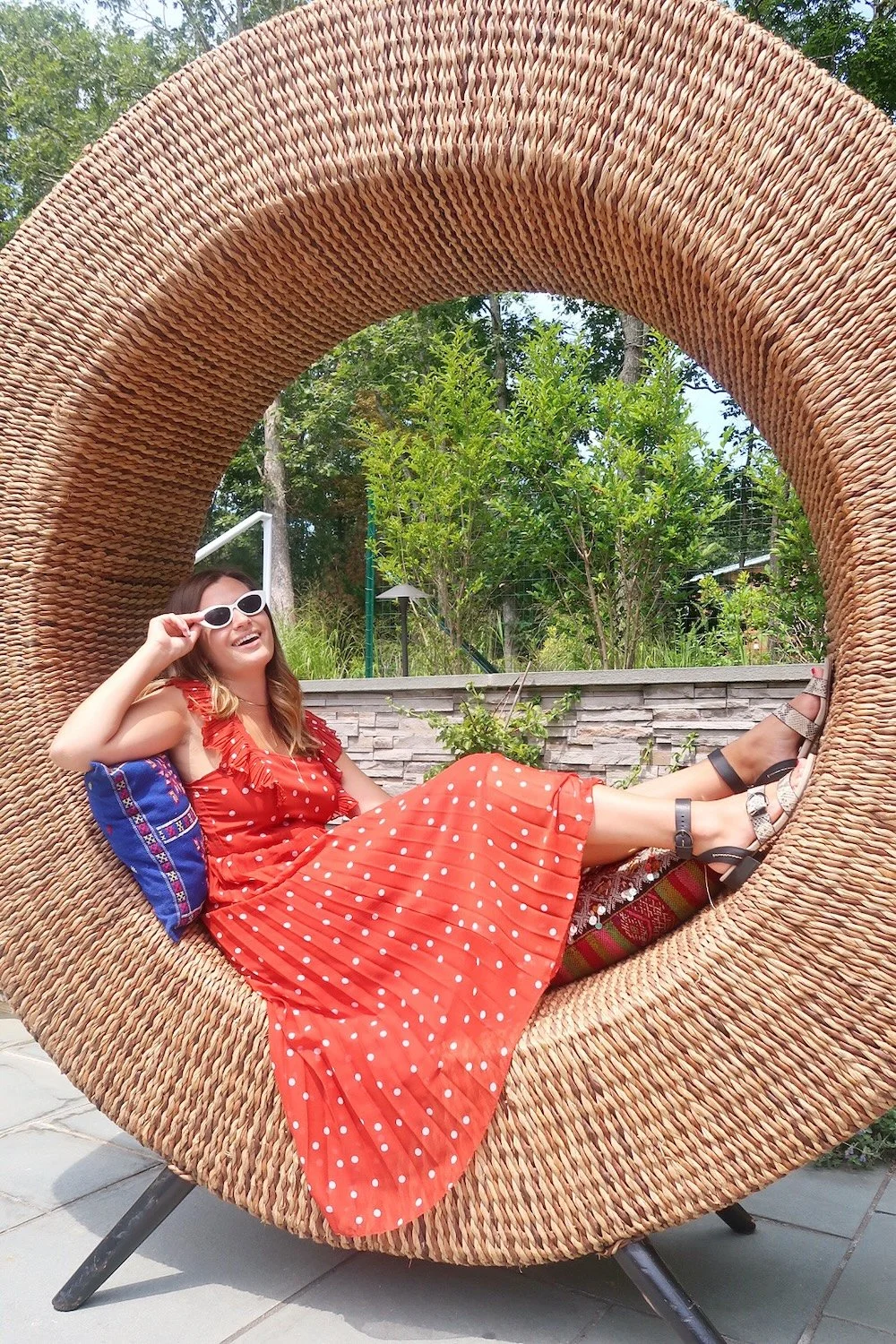 Keep Calm and Chiffon Blogger Austen Tosone shares The Summer Outfits I’m Wearing on Repeat This Year - in photo: Austen wearing Polka Dot Dress and White Sunglasses