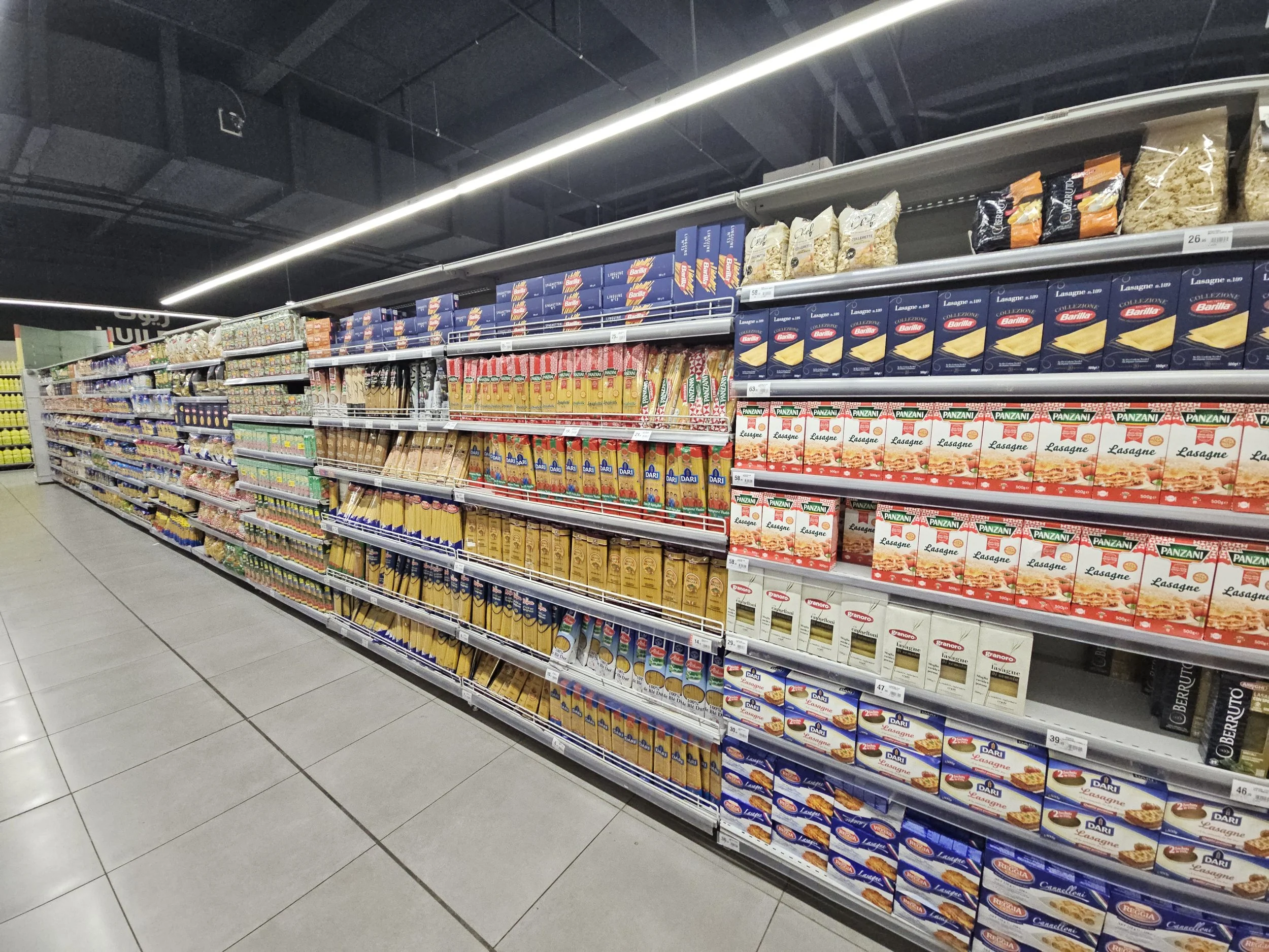  Grocery store showing vast pasta offerings, not including another half isle of couscous alone! 