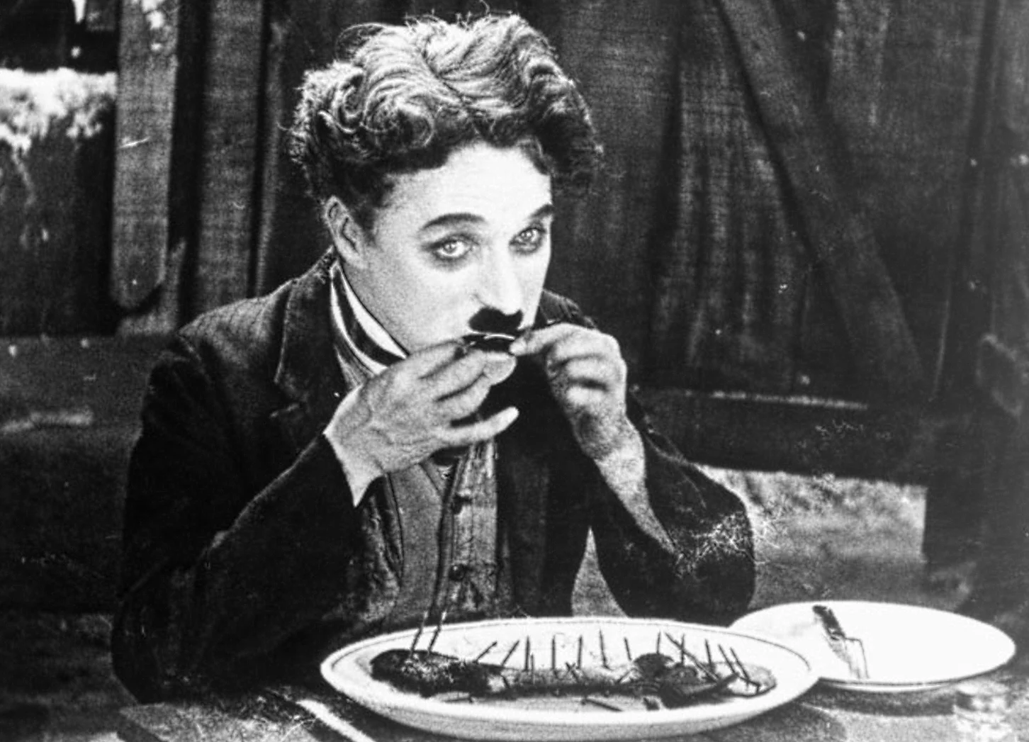 A 'silent' meal of sorts - Charlie Chaplin eats his boot in 'The Goldrush'