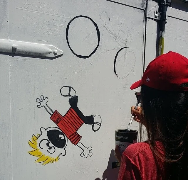 Painting the trailer - love Calvin and Hobbes!