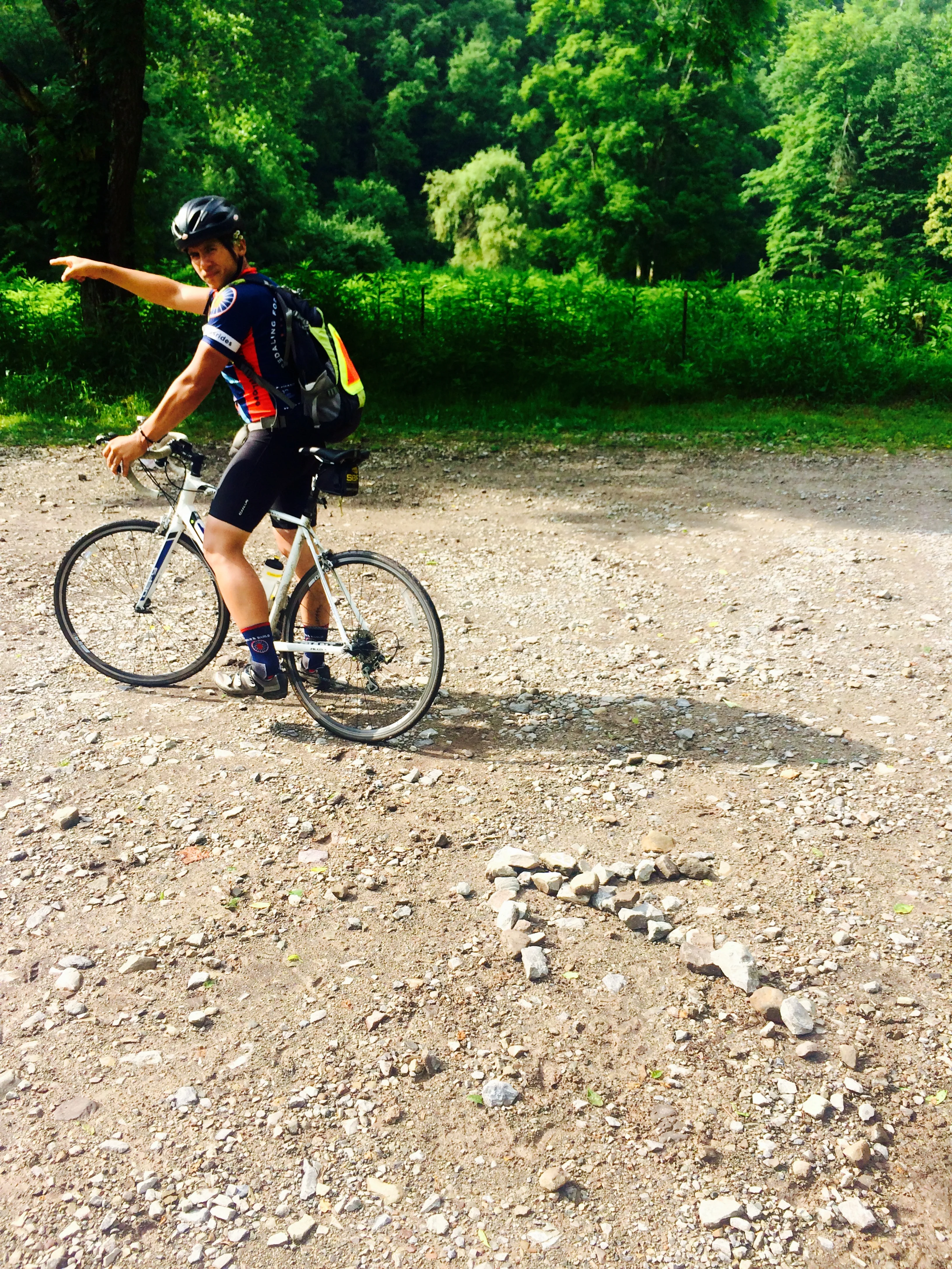 When there's no pavement to chalk on, we get creative to show the right way to go, like we did with this rock arrow.