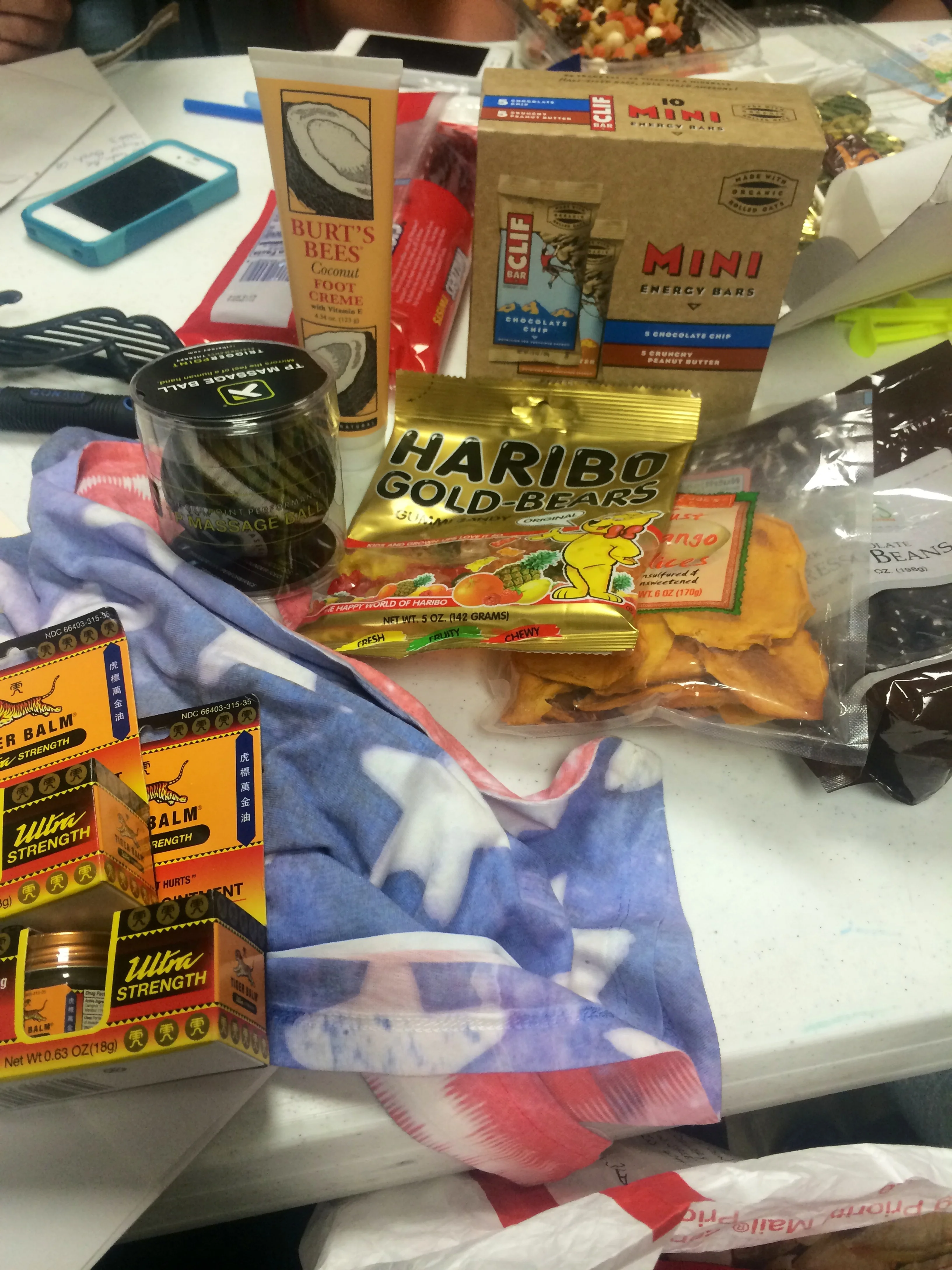 Some more love and generosity this week from The Rivoirs and my parents: some 4th of July apparel, a massage ball for knots, some foot free and tiger balm for post-ride, and some snacks. I'm having trouble packing my bin!!!! It doesn't fit!!!