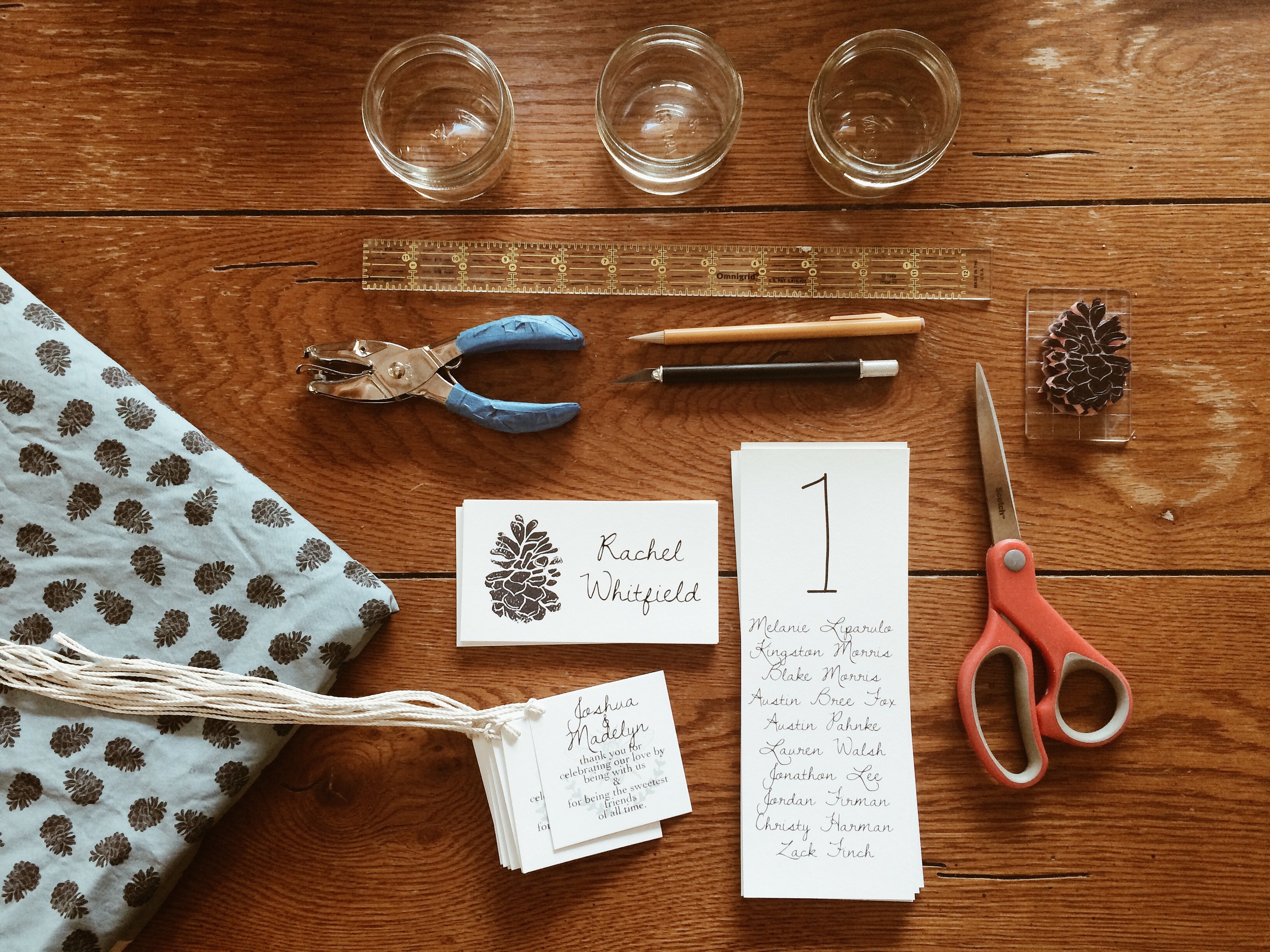 My hand carved pinecone stamp was used in several applications for the wedding.