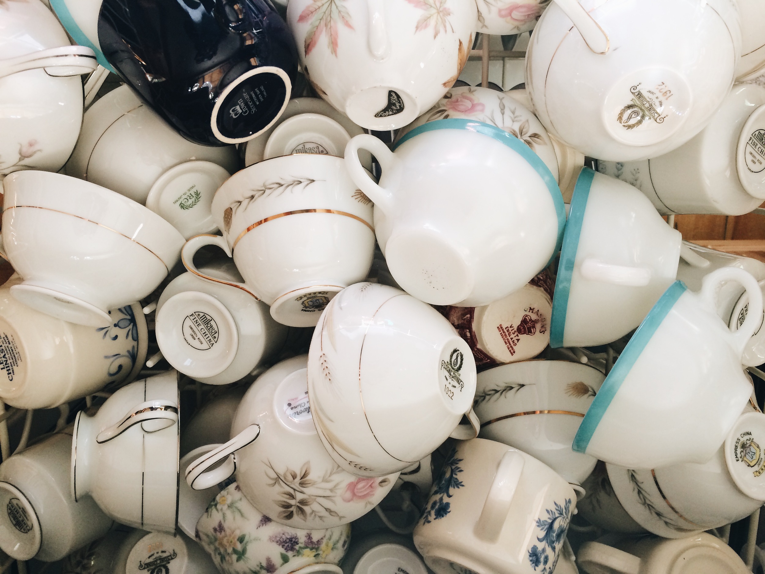 Maddy chose to use mix-matched china for her table settings. We had the humbling experience of washing all 900+ dishes before the wedding.. a very meditative process.