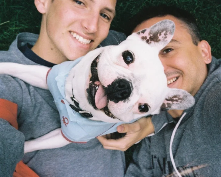 Luis and partner, Leo Rydell Jost, with Perri, their dog