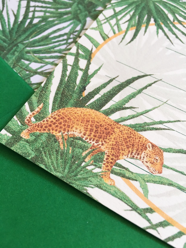 invitations with leopard and palm trees.jpg