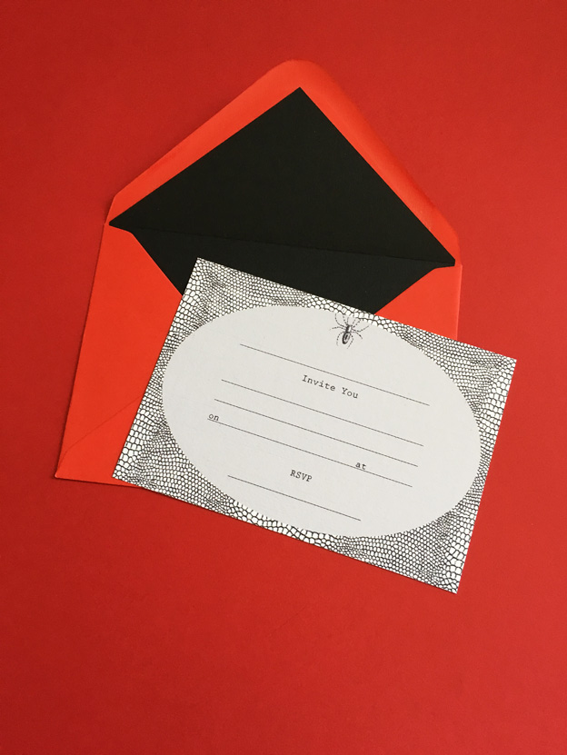 invitations with spider motif.jpg