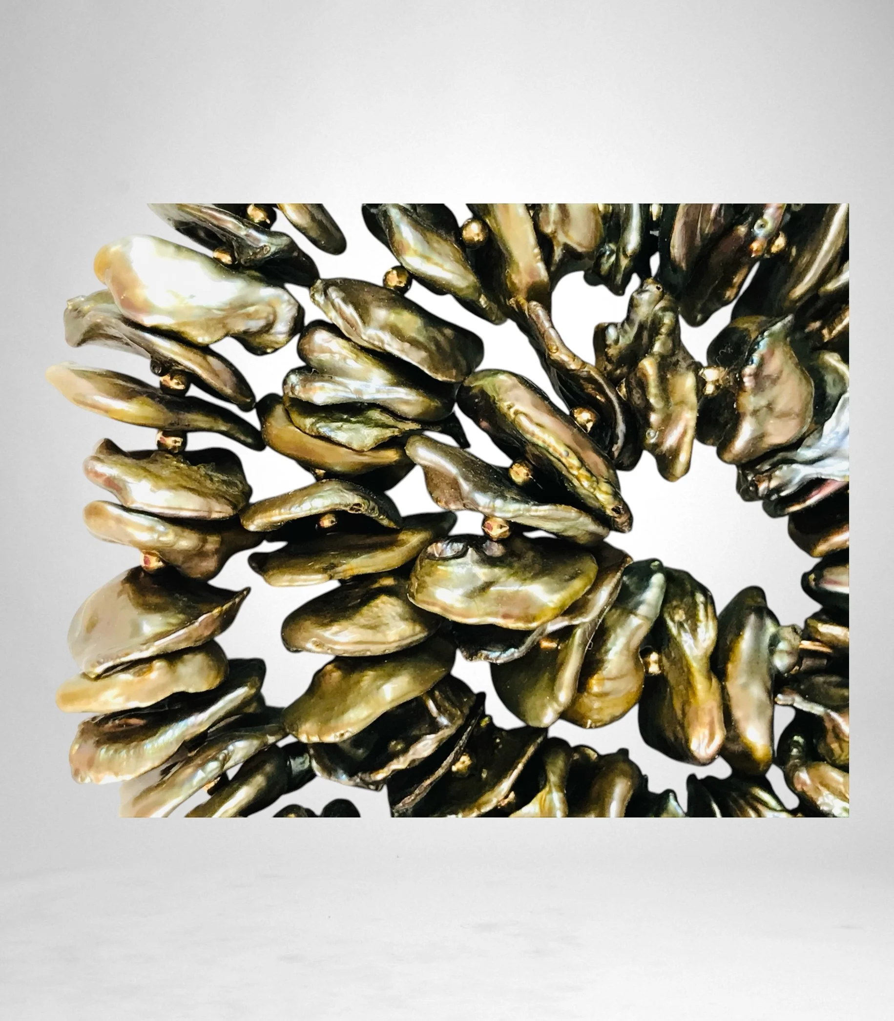 PR Green Heishi Pearl Close Up.jpeg