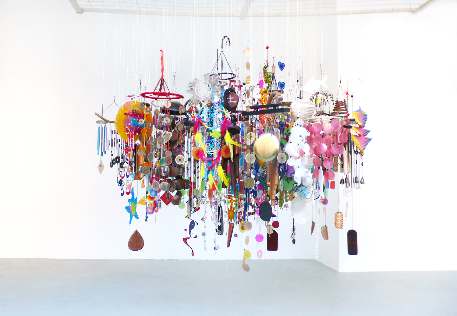   Mojo , 2012, metal, wood, bamboo, leather, glas, textiles, plastic, mussels, feathers, diameter ca 150cm Installation at the studio, Berlin 