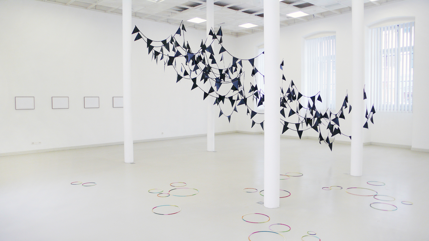    rift   , 2012, plastic, textiles, nylon, dimensions variable;  high&amp;low l-lV , 2012, aluminium leafs, glue on paper, 29,7 x 42cm;  ring , 2012, metal, wire, dimensions variable   gyre, 2012, Les Halles, Porrentruy 