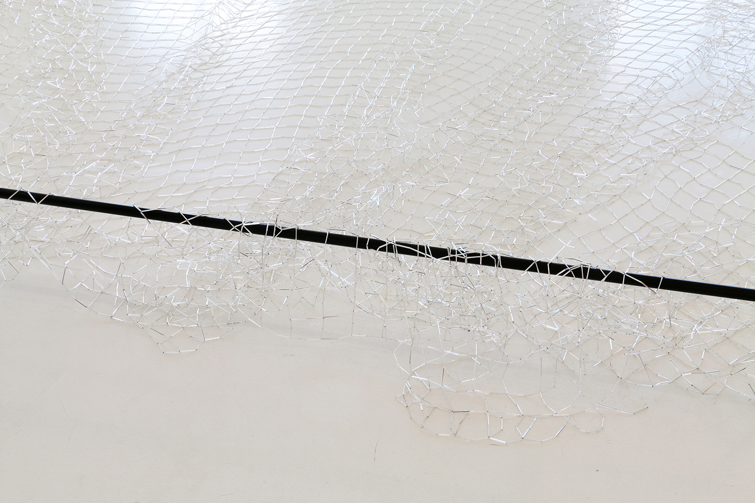   Wavelans / jharjhar , 2019, glass bugle beads, nylon thread, 500 x 700cm 