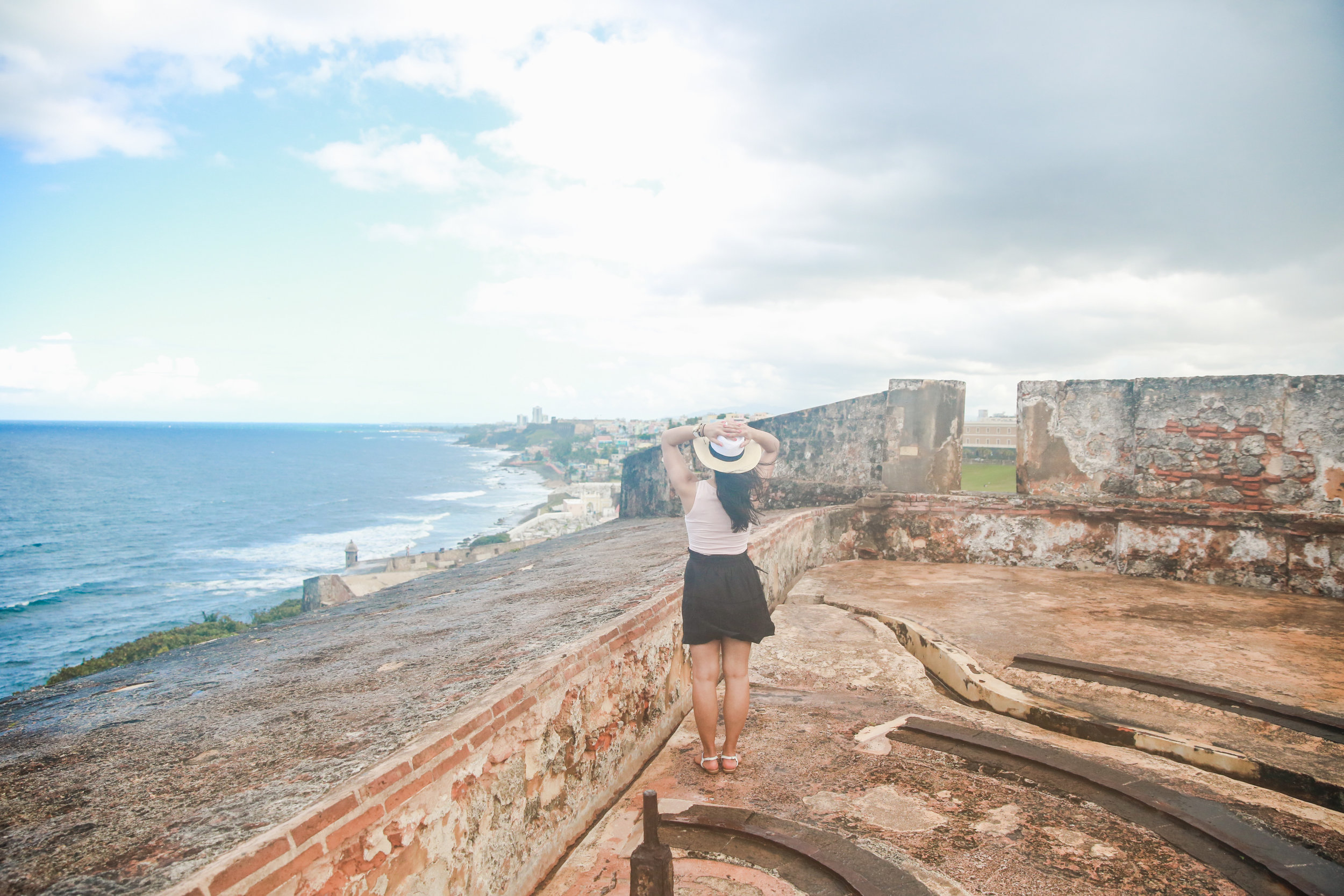 Taking it all in. Moments before this photo was taken, the wind tried to steal my hat. I luckily caught it just before it flew through the little opening on the right and into the courtyard!