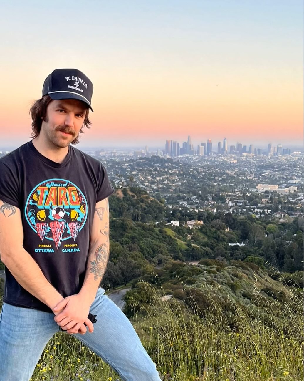 *SPOTTED!* Our good friend @sammy.j.scorpion rockin&rsquo; a classic TARG tee overlooking LA - awesome!! We&rsquo;ve got an amazing week of shows coming your way Ottawa - check out our listings and join us!!! 🙂👾🙂

Shows/Listings here:
http://www.h