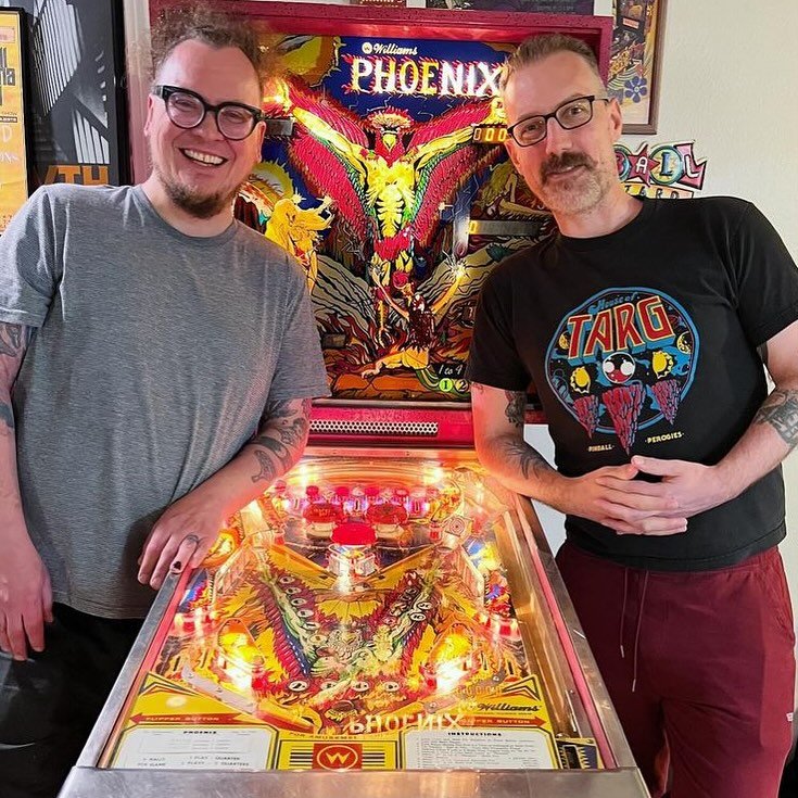 *SPOTTED!* @jitteryjeff rockin&rsquo; the classic TARG tee over some sweet old school PHOENIX pinball action in Denver - awesome!! We&rsquo;ve got a wicked week of pinball, perogies and shows coming your way Ottawa - check out our listings and join u