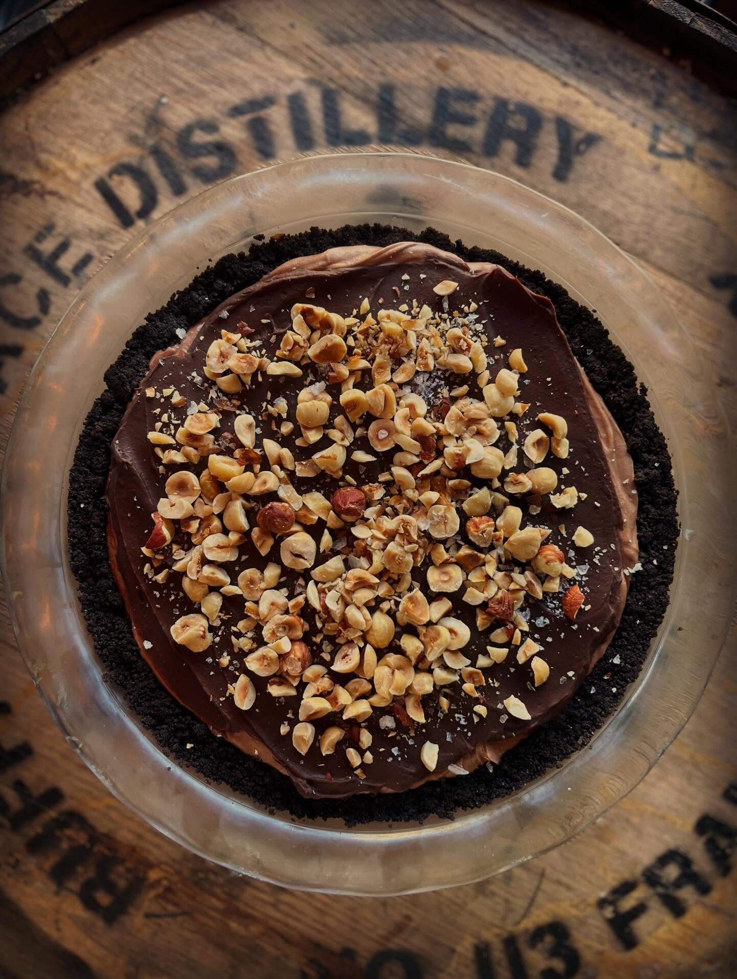 Back to normal hours, menu, and staff, and just in time for Pie &amp; Whiskey Wednesday. This one sold out fast last week&ndash; nutella mousse, chocolate ganache, oreo crust, toasted hazelnuts &amp; boozy whip. Plus $2 off @blantons_bourbon pours! A