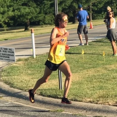 John in full flight to the finish! Global Champ and Age Graded Champ!