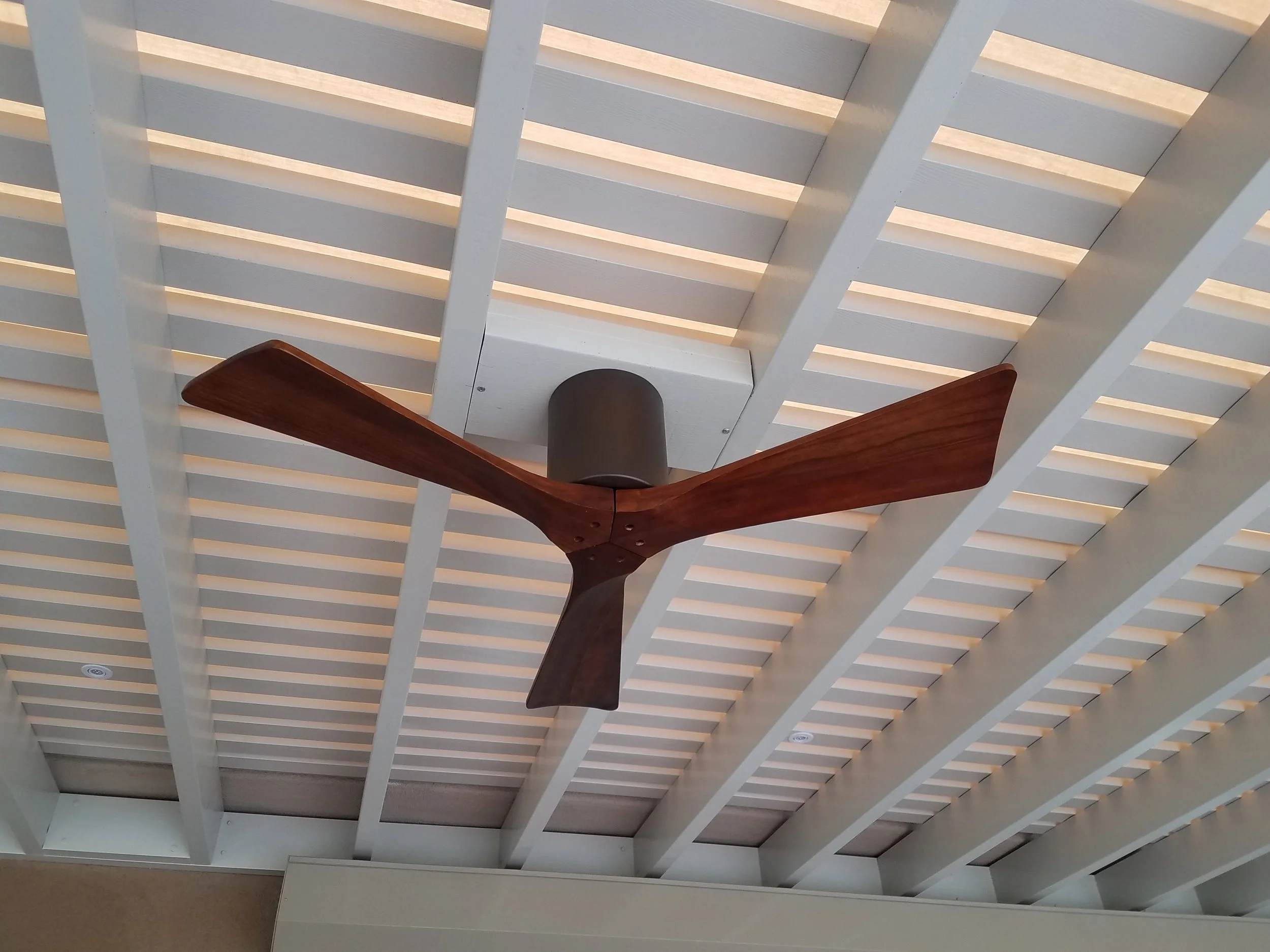 Modern fan on lattice patio cover Indio 92203
