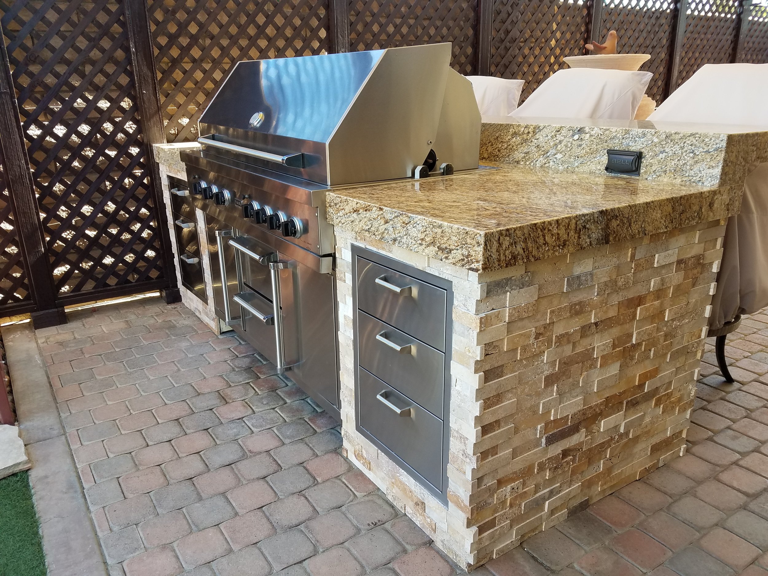 Custom built BBQ island with granite counter