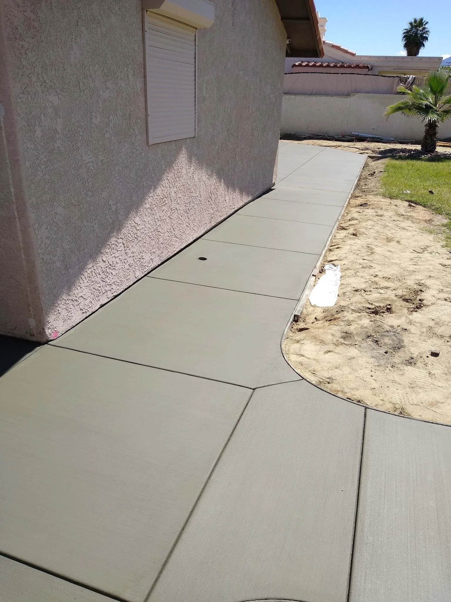 stamped concrete patio with fire pit on Affordable Concrete Patios Valley Patios Custom Aluminum Patio Cover Specialists