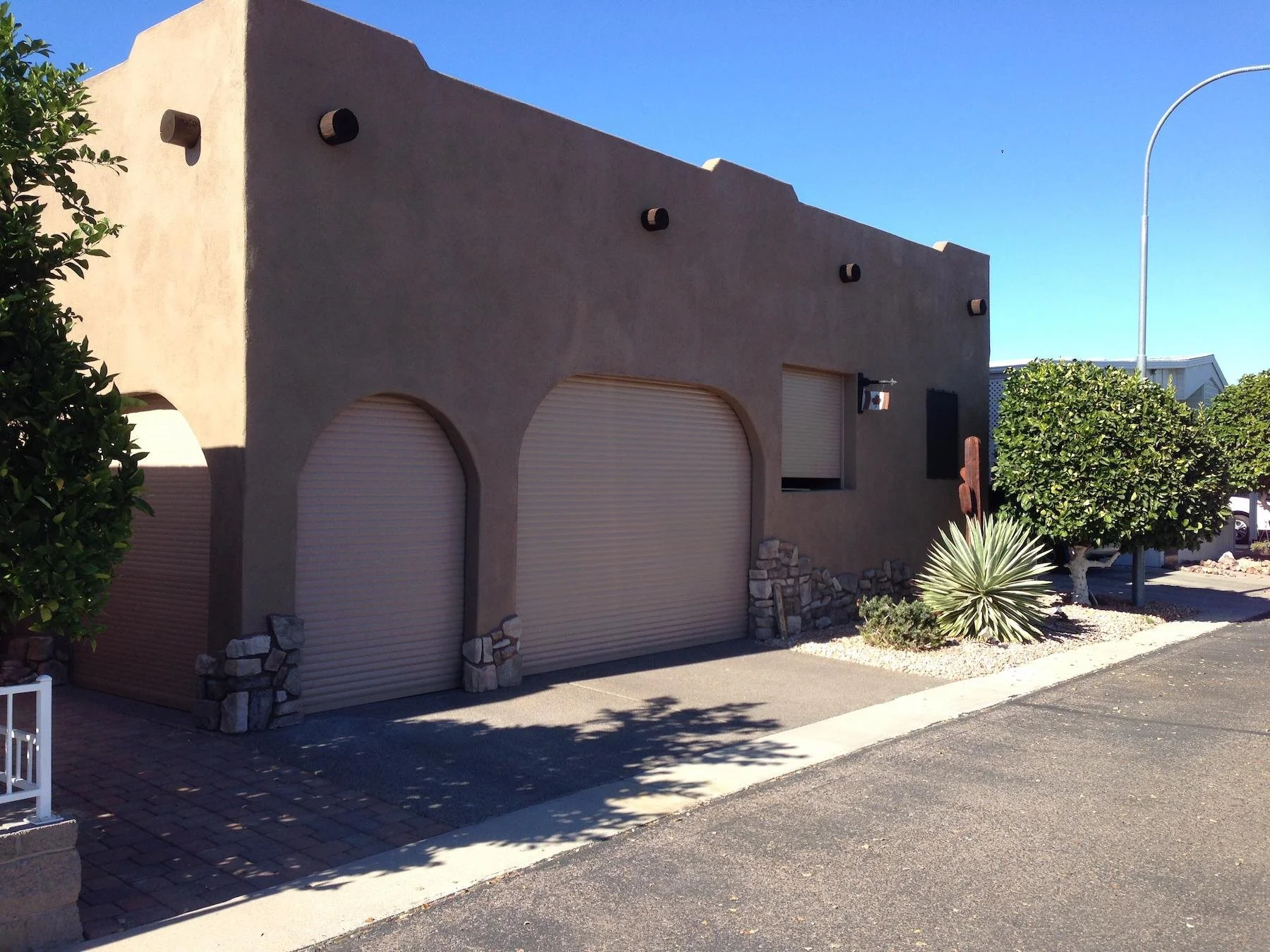 Inside or reverse mount rolling shutter for a carport