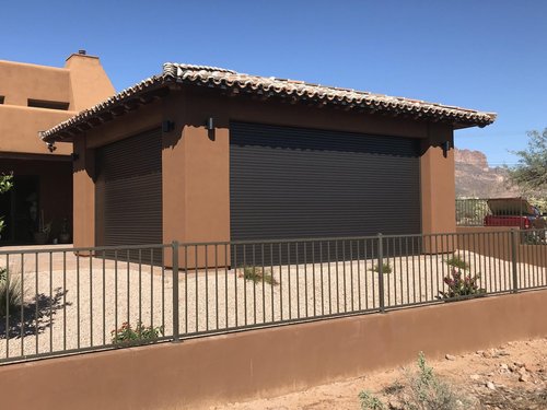 freestanding gazebo with closed rolling shutters