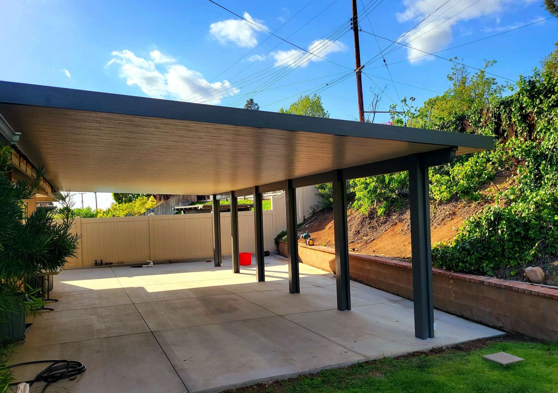 We installed this WeatherWood Insulated Roof patio cover in Irvine, CA to enable year round outdoor comfort. Two-tone colors are Siennawood & Beechwood